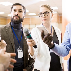 Reporters interviewing