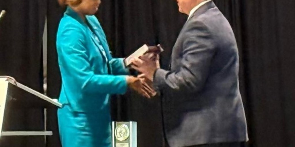 Judge Matia Receives Helping Hands Award